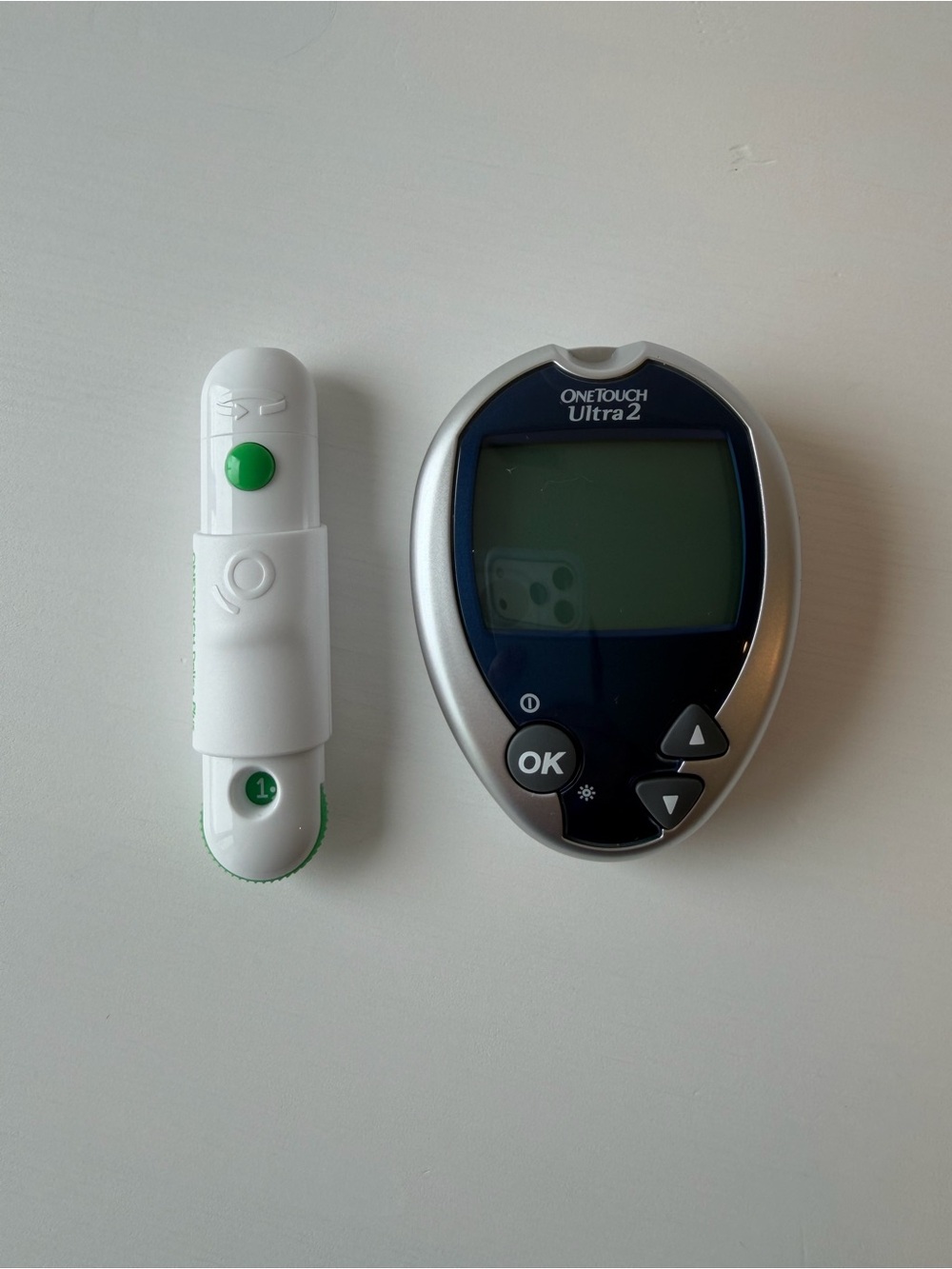 OneTouch Ultra2 Blood Glucose Meter in Silver and Navy and Lancing device